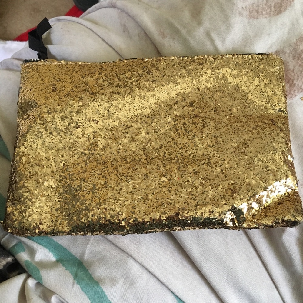 Gold makeup bag